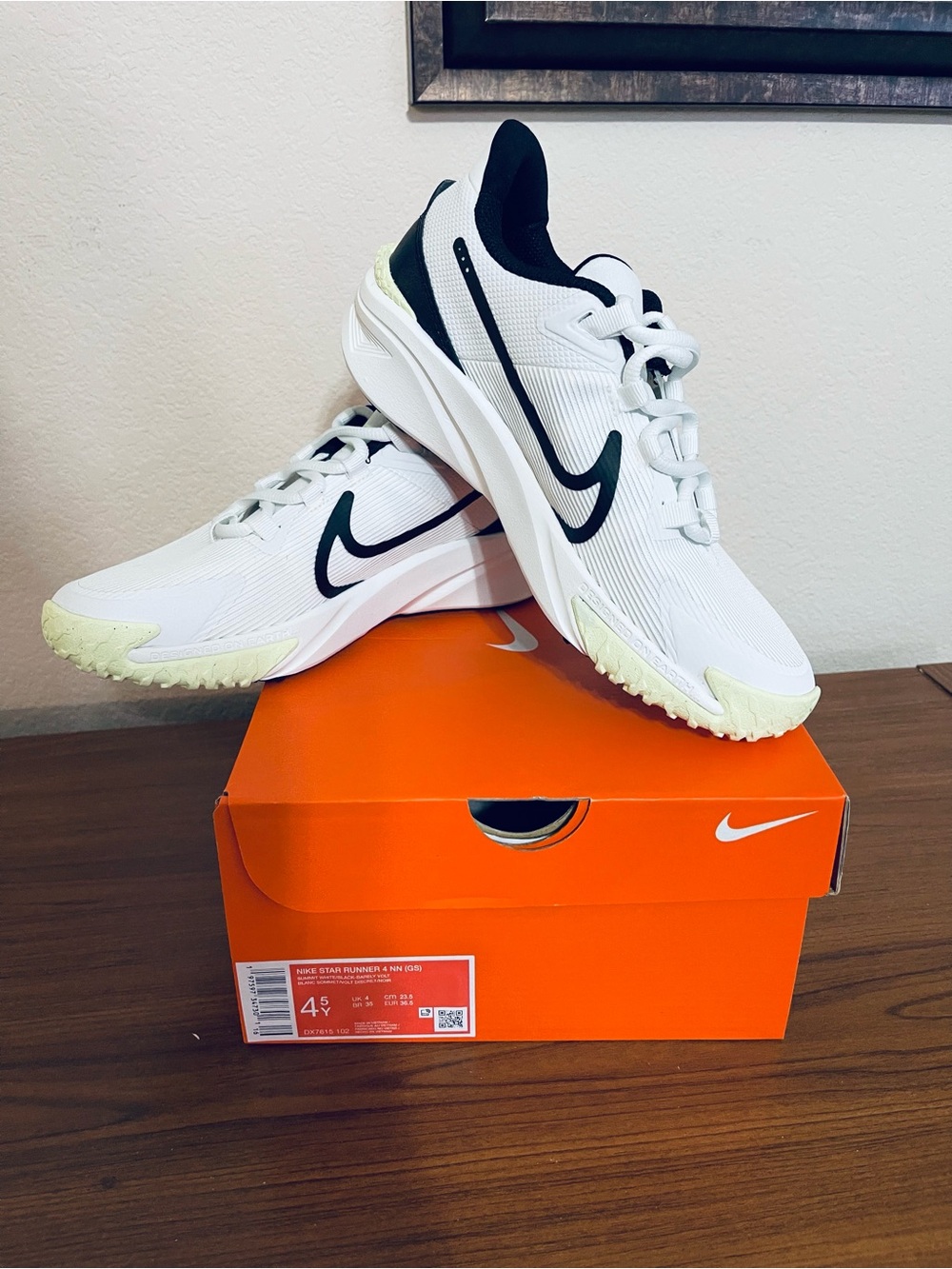 Nike White Black Swoosh Tennis Sneakers with Pale Yellow Accents